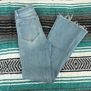 Worn flare bottom jeans